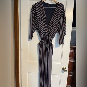Loved this! Made me look long and lean! Navy and maroon, striped romper